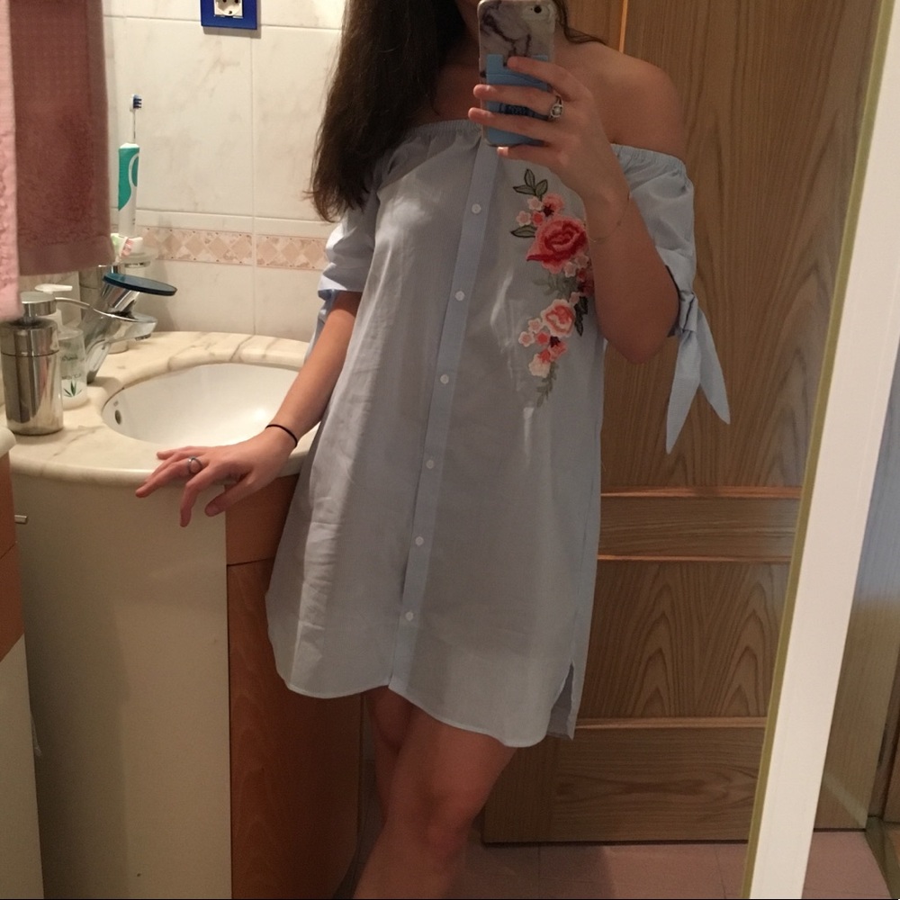 Boutique dress with floral accents